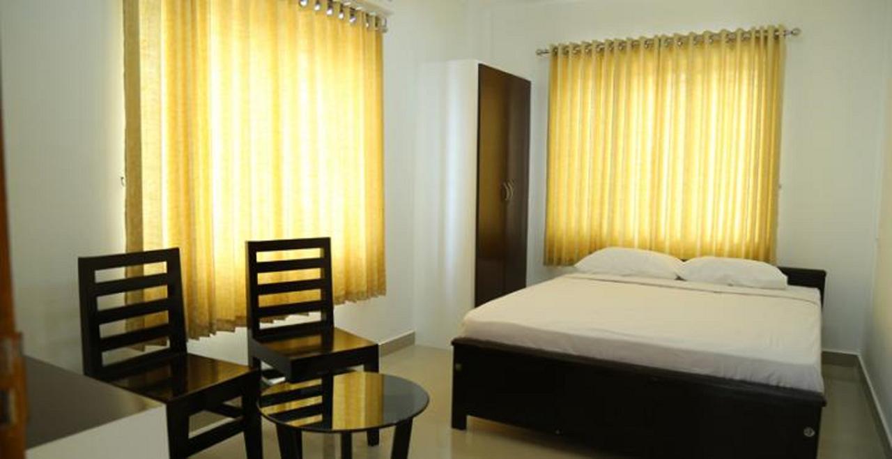 Sara Hotels And Apartments Nedumbassery Bagian luar foto