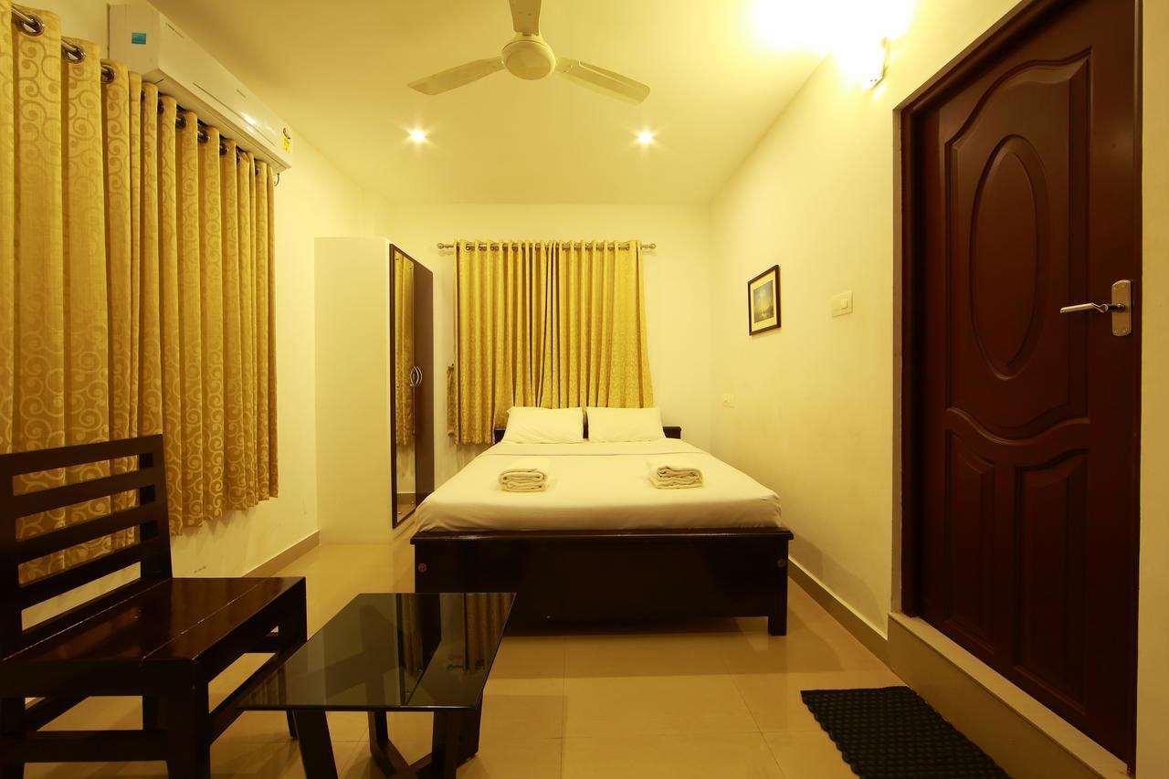 Sara Hotels And Apartments Nedumbassery Bagian luar foto